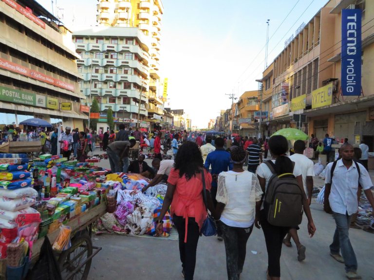 Traders and produce stalls at Kariakoo Market in Dar es Salaam, Tanzania's largest wholesale and retail market