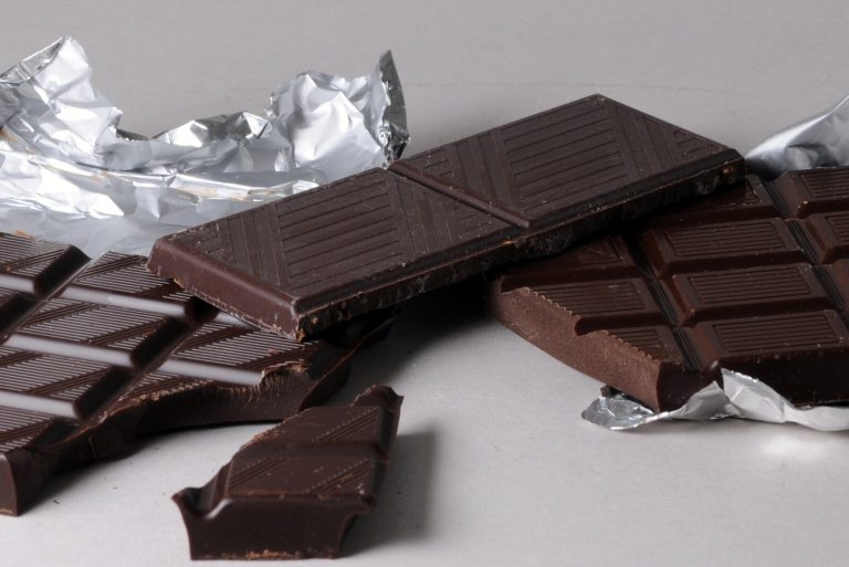 Broken pieces of dark chocolate bar