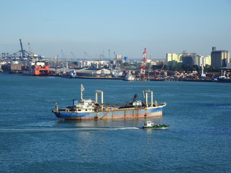 Cargo vessels and port equipment at the Port of Dar es Salaam, Tanzania's main gateway for commodity exports